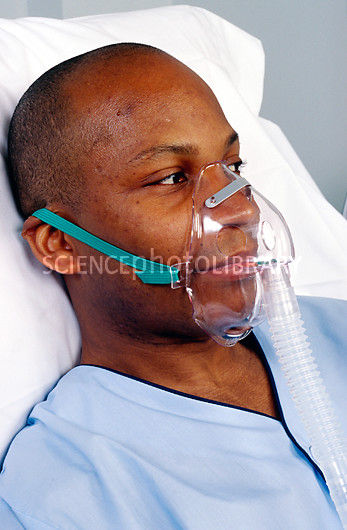 Aerosol oxygen mask on patient
